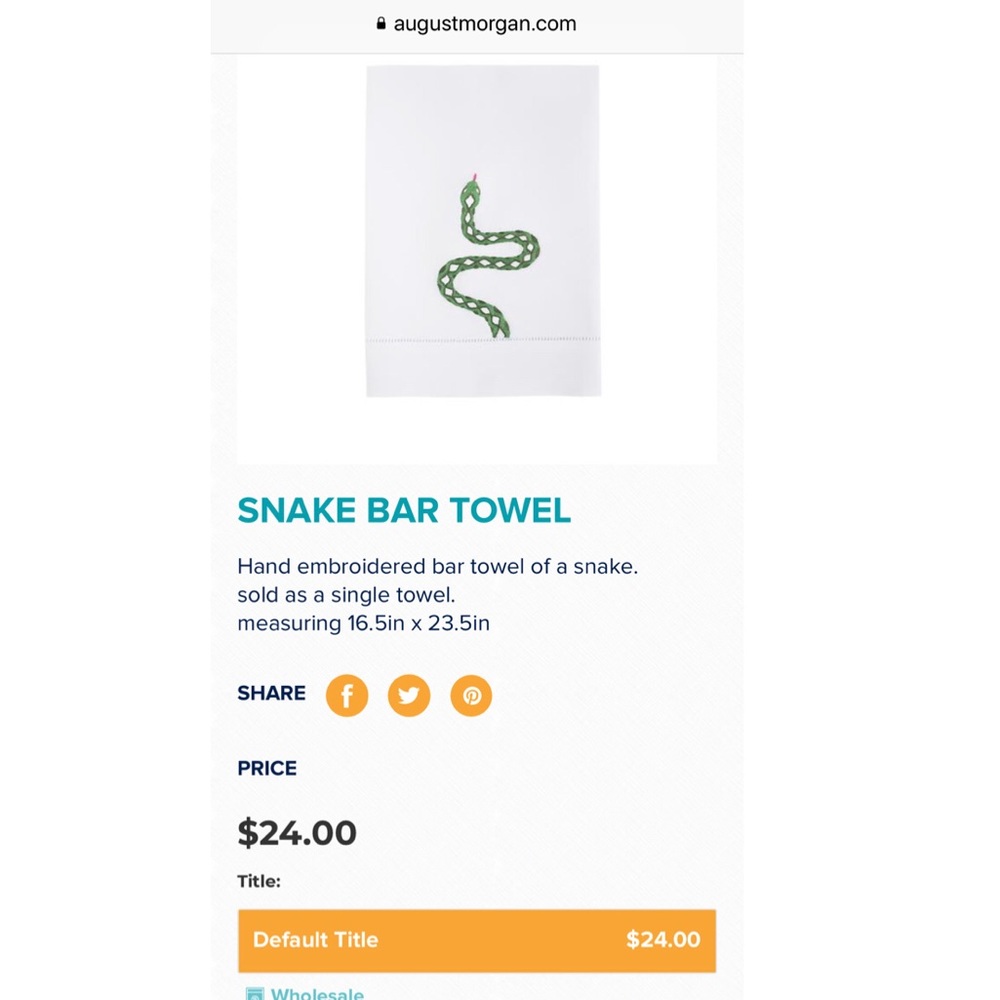 Hand embroidered bar towel of a snake.